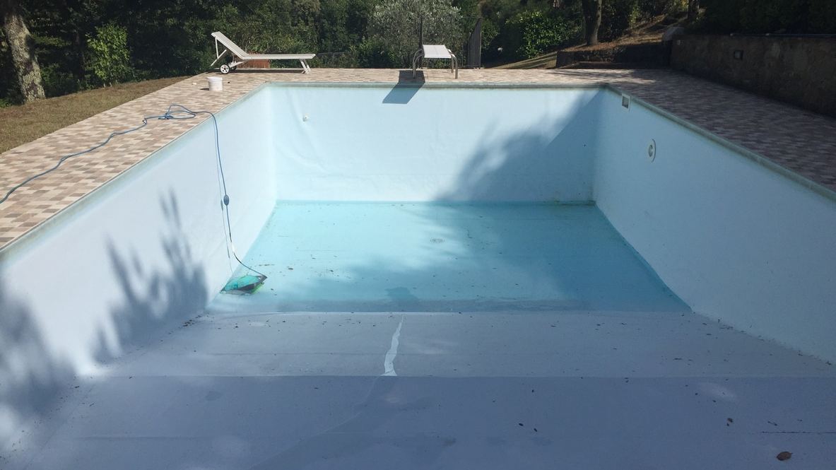 Drained pool prepared for an acid wash near Deer Valley Phoenix AZ