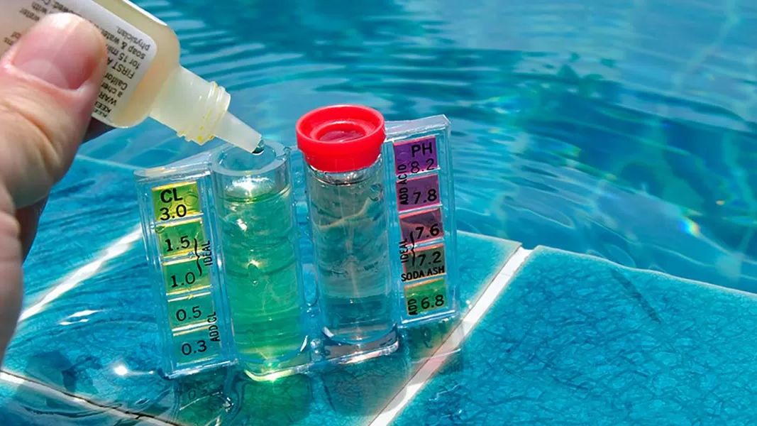 Testing free chlorine and pH with a pool water test kit before shocking a Phoenix pool